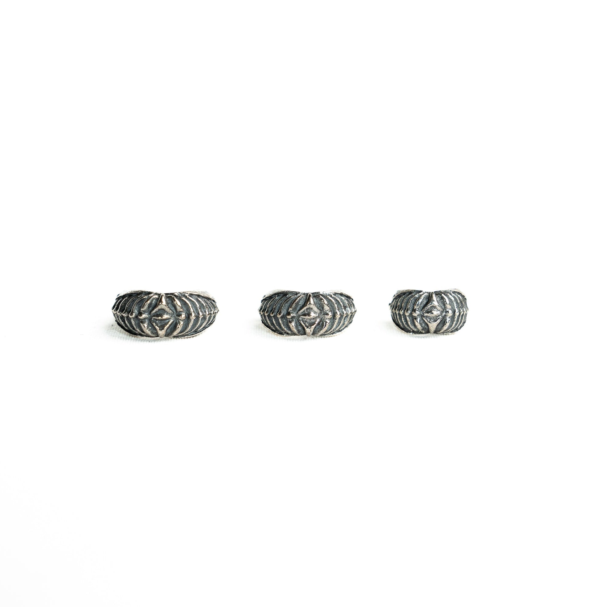 Three Silver 925 septum clickers in different inner diameters (6mm, 8mm, and 10mm), arranged in a row to compare sizing options.